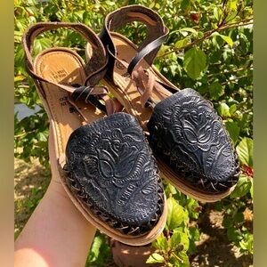 Black huarache sandals
